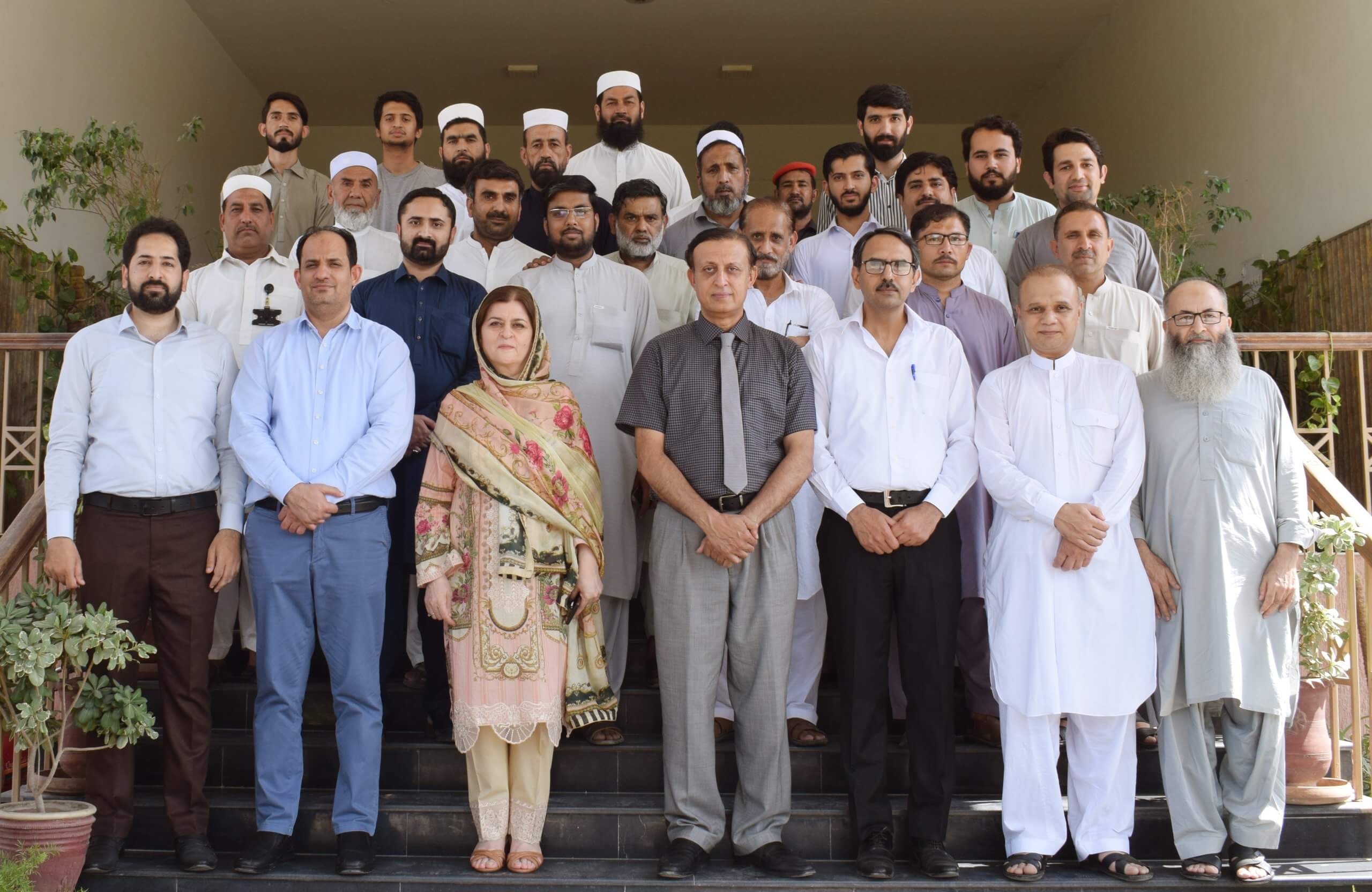 Group Picture of PGMI Staff with Honorable CEO. Prof. Dr. M. Arif Khan and Deputy CEO, Dr. Hamid Ahmad